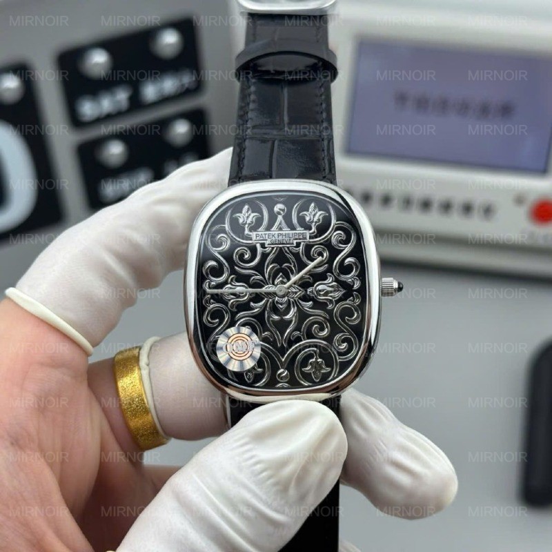 Dong-Ho-Patek-Philippe-Golden-Ellipse-5738-Grand-Feu-Black-Enamel-Nha-May-OM-345x395mm-1-1024x1024.jpg