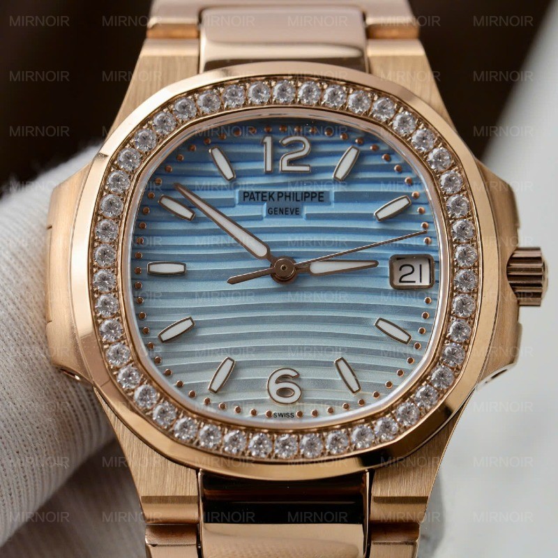 Dong-Ho-Patek-Philippe-Replica-11-Nautilus-7010R-Nu-Mat-Xanh-Trang-Day-Kim-Loai-Xuong-GR-32mm-2.jpg