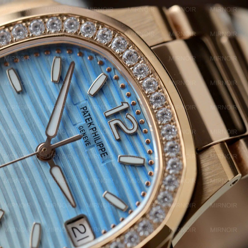 Dong-Ho-Patek-Philippe-Replica-11-Nautilus-7010R-Nu-Mat-Xanh-Trang-Day-Kim-Loai-Xuong-GR-32mm-4.jpg