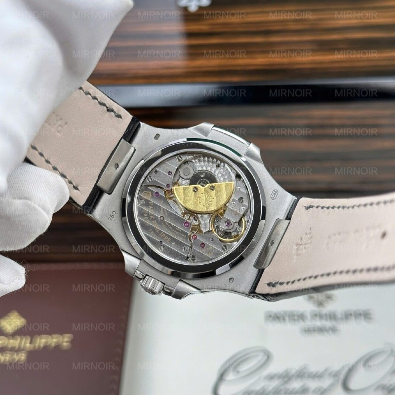 Dong-Ho-Patek-Philippe-Nautilus-5722-Replica-11-Mat-Xam-Dinh-Da-Baguette-Nha-May-PPF-40mm-1-1024x1024.jpg