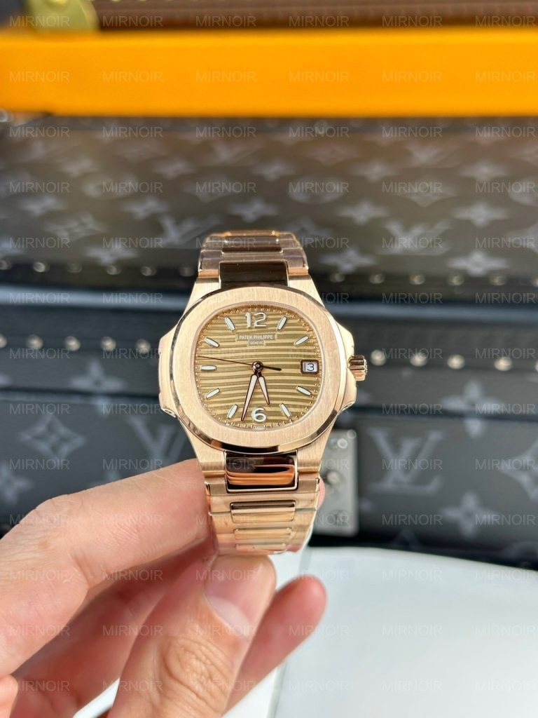 Dong-Ho-Patek-Philippe-Nu-Mau-Vang-Hong-May-Pin-Nautilus-7010-32mm-3.jpg