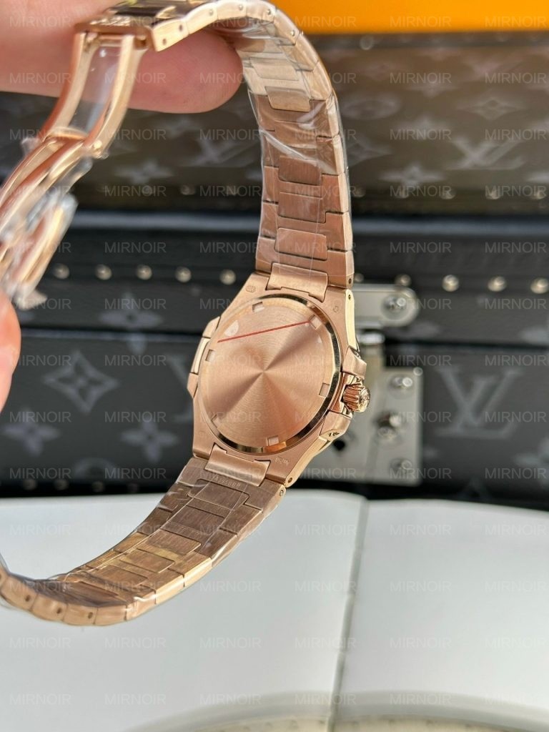 Dong-Ho-Patek-Philippe-Nu-Mau-Vang-Hong-May-Pin-Nautilus-7010-32mm-8.jpg