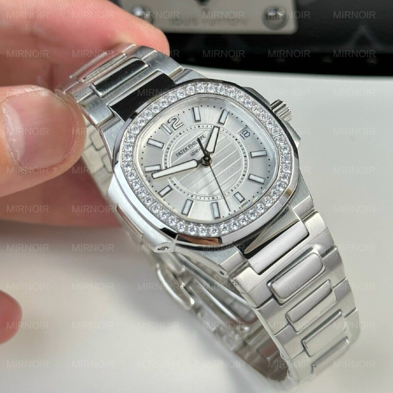 Dong-Ho-Patek-Philippe-Nu-Day-Kim-Loai-Nautilus-7010-Dinh-Da-32mm-6.jpg