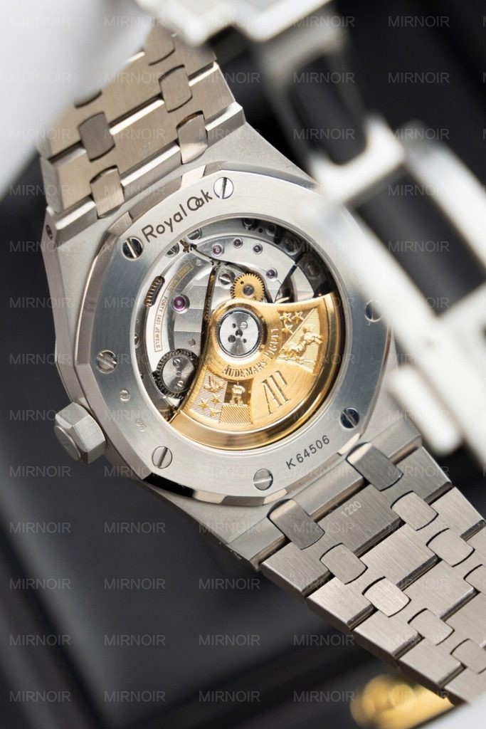 Dong-Ho-Audemars-Piguet-Replica-11-Royal-Oak-Frosted-Gold-15454BC-Mat-Xanh-Duong-Xuong-APS-37mm-8-683x1024.jpg