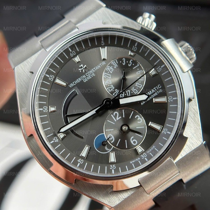 Dong-Ho-Nam-Vacheron-Constantin-Replica-11-Overseas-Dual-Time-47450-Mau-Xam-Nha-May-9F-42mm-7-1024x1024.jpg