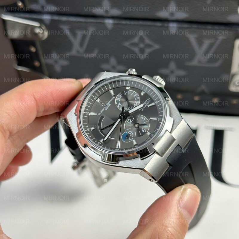 Dong-Ho-Nam-Vacheron-Constantin-Replica-11-Overseas-Dual-Time-47450-Mau-Xam-Nha-May-9F-42mm-8-1024x1024.jpg