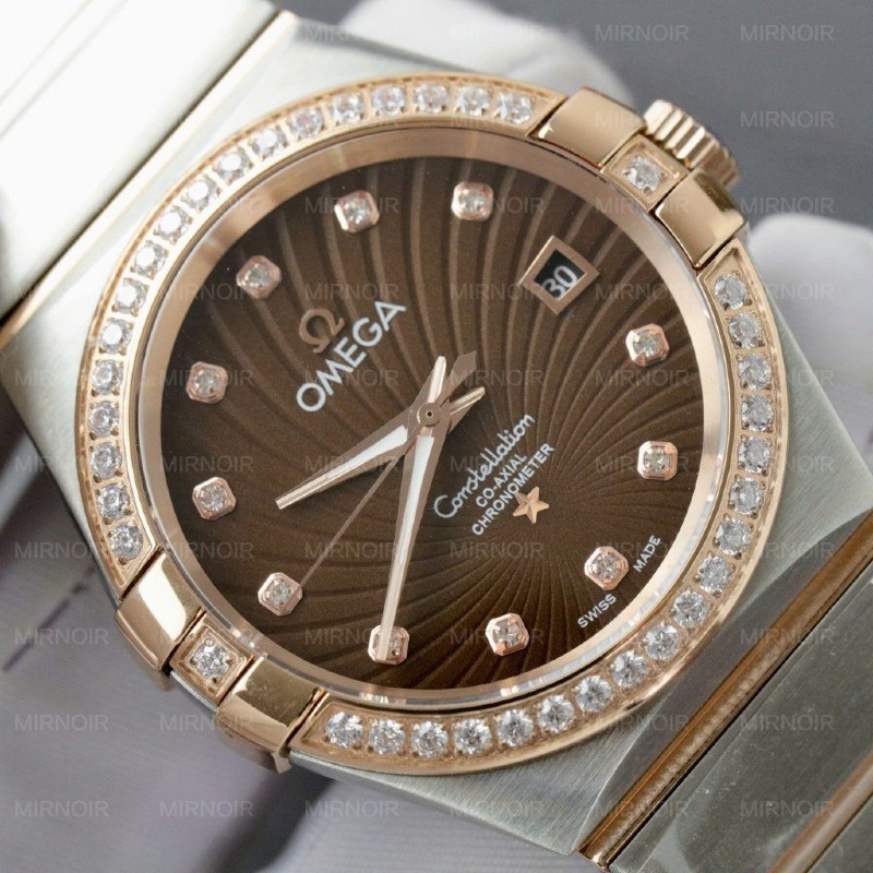 Dong-Ho-Omega-Constellation-Co-Axial-Fake-11-Demi-Vang-Hong-Mat-Nau-38mm-5-1024x1024.jpg