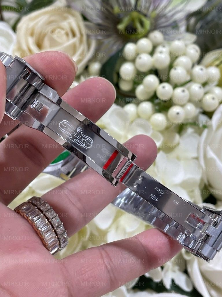 Dong-Ho-Rolex-Che-Tac-Daytona-126599TSA-Boc-Vang-Trang-18K-Da-Sapphire-Xanh-Nhan-Tao-40mm-3-768x1024.jpg