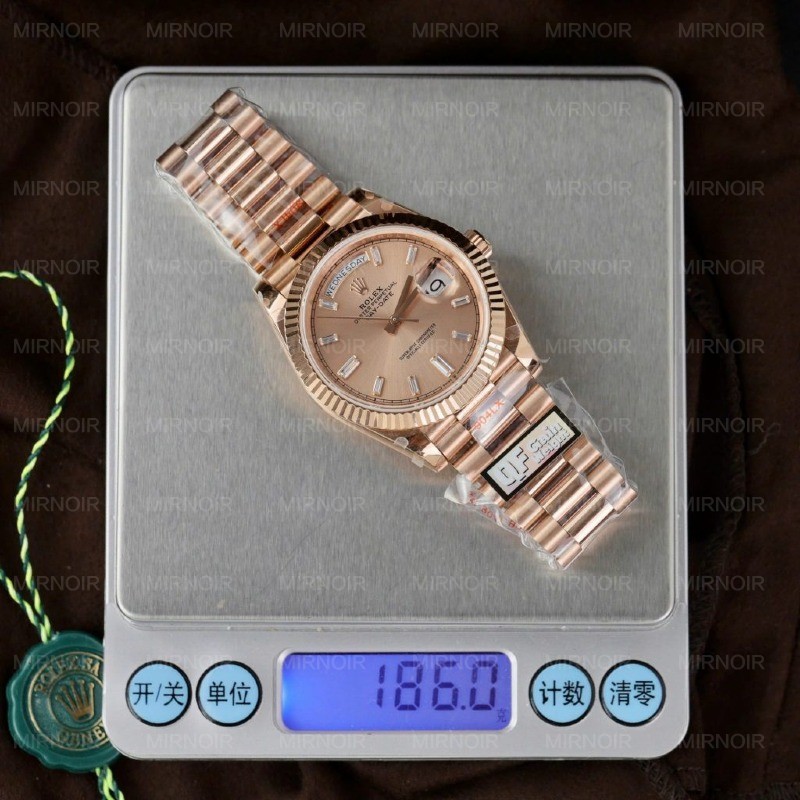 Dong-Ho-Rolex-Day-Date-Mat-Hong-Sundust-Replica-11-Ma-Vang-Hong-Trong-Luong-186-Grams-QF-40mm-1-1024x1024.jpg