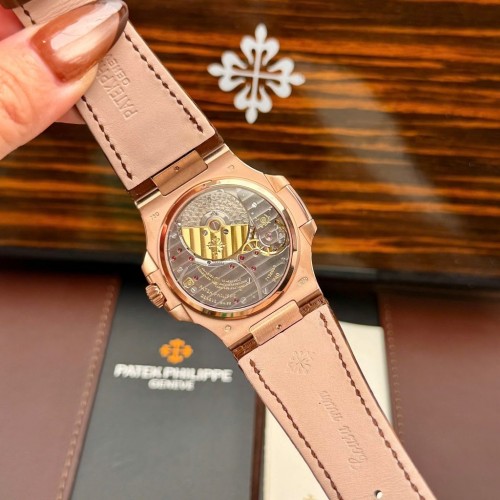 파텍필립 노틸러스 - Patek Philippe Nautilus 5724 Gray Dial Bezel Stone Red Baguette 40mm