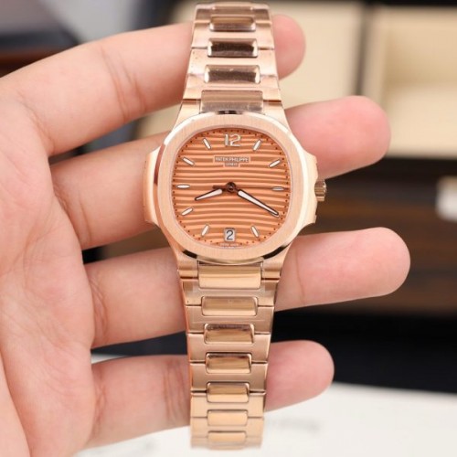파텍필립 노틸러스 - Patek Philippe Nautilus 7118 Pink Orange Dial Automatic Movement 35.2mm
