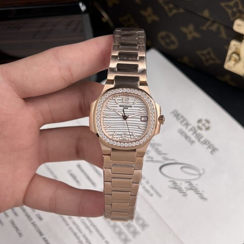 파텍필립 노틸러스 - Patek Philippe Nautilus 7010 White Dial Womens 32mm