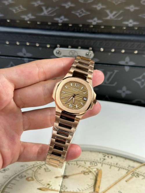 파텍필립 노틸러스 - Patek Philippe Nautilus 7010 Rose Gold Womens 32mm